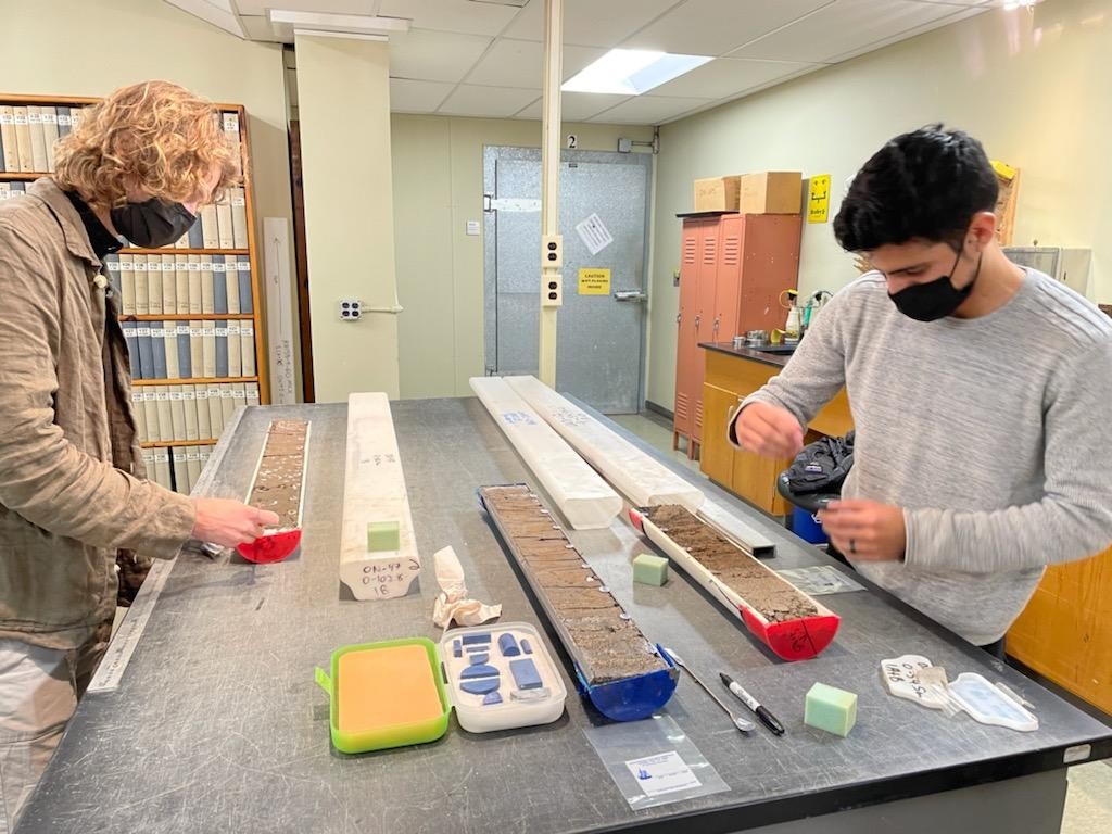 Students doing lab work on a core